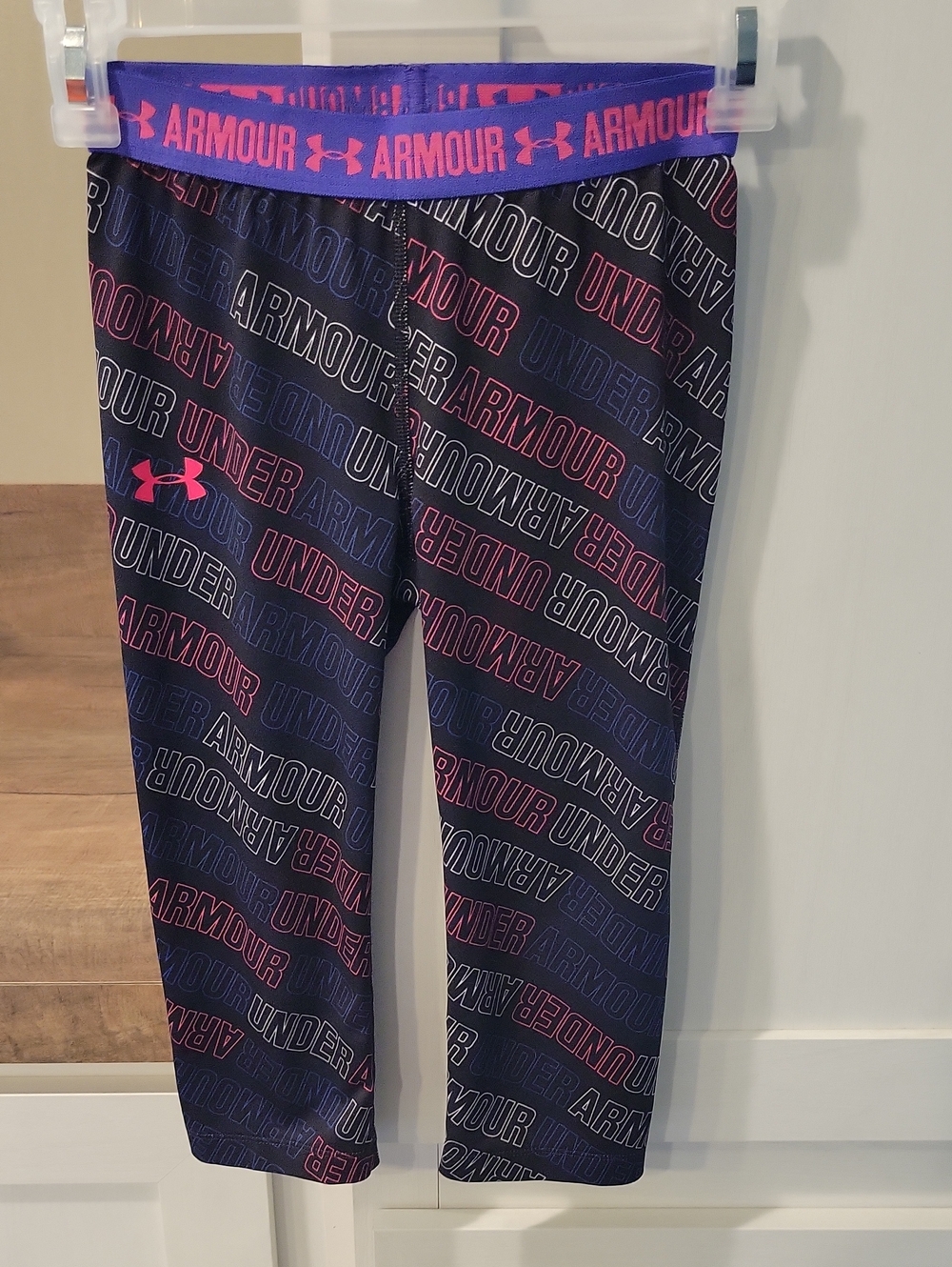 Under Armour Navy and Pink All-Over Logo Capri Leggings